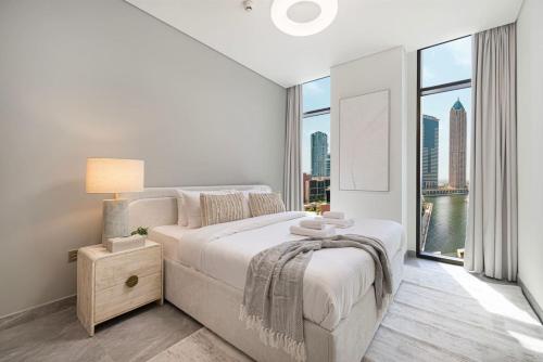 Brand-New 1BR Peninsula With Canal Views, Dubai (Foto 3)