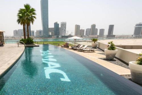 Vacationer l Stylish 1 Bedroom l Downtown Dubai l Pool, Gym Access, Dubaj (zdjęcie 2)