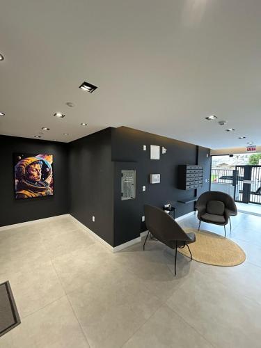 LOFT in Florianópolis Beach (LOFT in Florianopolis Beach) in กาโชเอย์รา โด บอม เชซุส