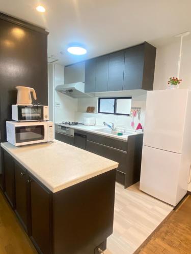 raikoエレベーター付き大人数向け一棟貸切宿 in Kiyosu