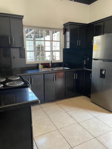 Közös társalgó / TV, Trébol House Hostel (Trebol House Hostel) in La Ceiba