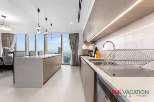 SML Vacation Homes - Sky High Apartments with Burj Khalifa and Dubai Fountain Views at Grande Signature Downtown Dubai - main image