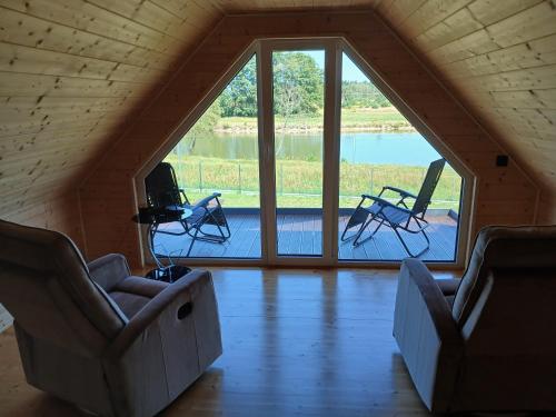 Domek nad Jeziorkiem Sauna -Silownia-Balia in Юліанув