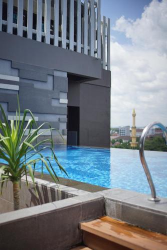 Swimming pool, PORTA by Ambarrukmo in Depok