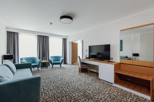 Aparthotel Termy Uniejów (Aparthotel Termy Uniejow) in Унеюв