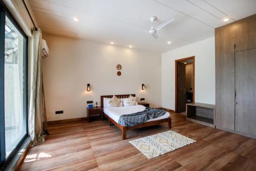 SaffronStays Pebble House - 3BR riverside villa with glass walls, terraces & Nun River views, Dehrad in Galajwari
