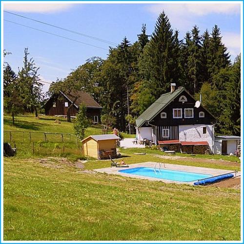 Na Sluneční Pohádková chaloupka ve Sladké díře