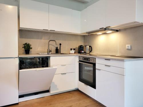 مطبخ, Gemütliche Ferienwohnung Windjammer mit Parkplatz - Nur 50 Meter zum Ostsee Sandstrand (Charmante Ferienwohnung mit Terrasse - nur 50m zum Strand mit eigenem Parkplatz und Fahrradunterstel) in Sierksdorf