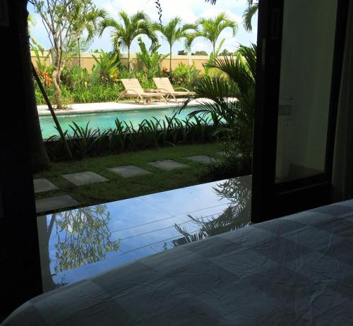 A Hotelcom Indah Homestay Guest House Seminyak - 