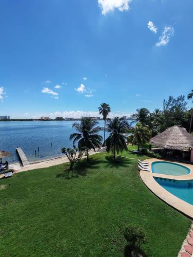 Casa hermosa en zona hotelera frente laguna