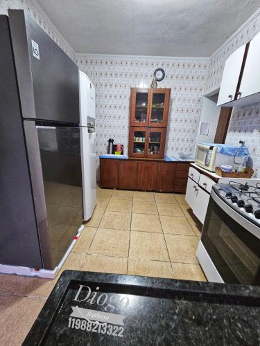 Casa Praia Grande WIFI 3dorm 2ban 2carr churrasq 400mts da praia Tupi in วีลาตูปี