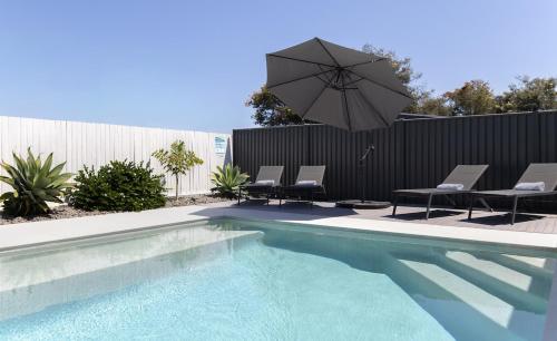 Surfrider Hideaway - steps to beach, Mudjimba (foto 8)