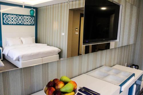 Chambre triple, deluxe
