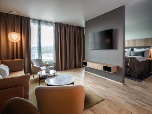 gedeelde lounge/tv-ruimte, Quality Hotel Airport Vaernes in Stjordal