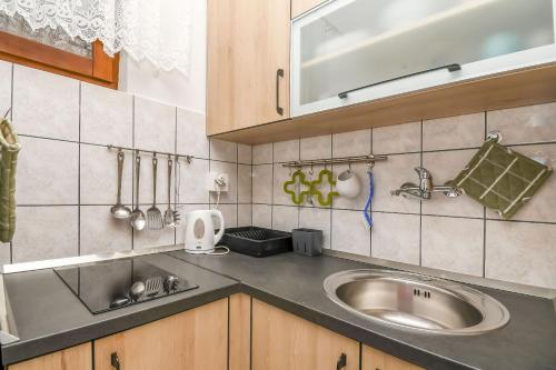 Apartments Ivo - barbecue - image 8