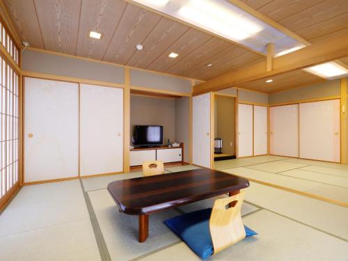 Kanko Hotel Tamaru - Tap to explore photos