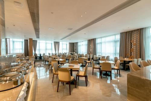 Restaurant, ShengDa International Hotel in Sikhottabong District