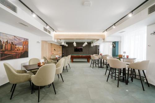 Koplietošanas atpūtas telpa ar TV, Hotel YVY in Lancrăm