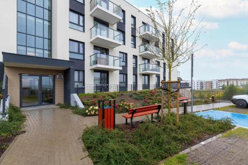 Vista Exterior, Stylish Apartment in a Modern Development Parking & Balcony by Noclegi Renters in Jasien