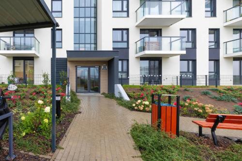 Vista Exterior, Stylish Apartment in a Modern Development Parking & Balcony by Noclegi Renters in Jasien