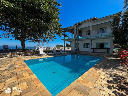 Casa costeira com vista e área gourmet no Borrifos (Casa costeira com vista e area gourmet no Borrifos) in Praia de Itapecerica