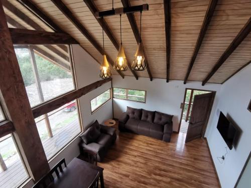 Közös társalgó / TV, Cabaña monte rio (Cabana monte rio) in Puerto Aisen