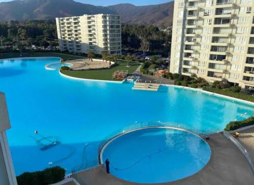 Departamento en Papudo laguna con acceso a la playa – khách sạn tại Los Corrales