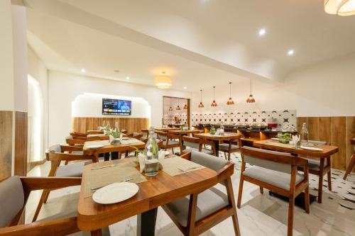 Restaurant, The Liverpool Hotels Marathahalli Outer Ring Road in Marathahalli