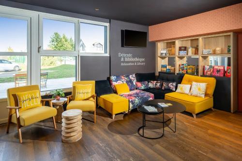 ห้องส่วนกลางสำหรับนั่งเล่น/ดูทีวี, Sure Hotel by Best Western Dole in โดล