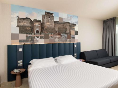 Superior Double Room with Sofa Bed and Balcony with Side Sea View