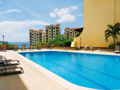 Piscina, Presidential Suites 4 - Spacious condo in the heart of Flamingo, sleeps 6 in Playa Flamingo