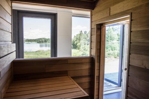 Contemporary design lake cabin in Otepaa