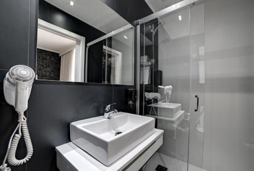 ห้องน้ำ, Hotel Pilar Plaza. in ซาราโกซ่าซิตี้เซ็นเตอร์