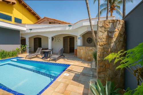 Casa com Piscina - Churrasqueira - 80m da Praia – khách sạn tại Balneario Cidade Atlantica