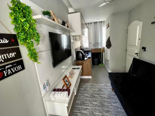 Shared lounge/TV area, Rocinha Apart in Rocinha