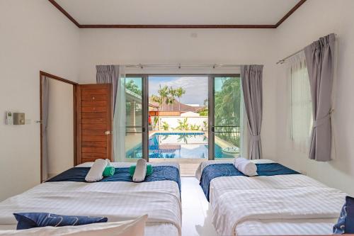 客室内ベッド, Orchid Pool Villa Rawai in プーケット