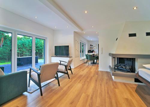 Ferienhaus Waldblick mit Whirlpool und Sauna in Hellwege