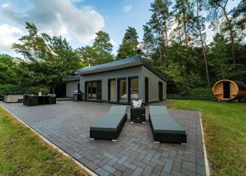 Hotelli välisilme, Ferienhaus Waldblick mit Whirlpool und Sauna in Hellwege