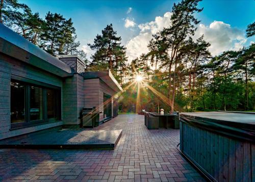 Hotelli välisilme, Ferienhaus Waldblick mit Whirlpool und Sauna in Hellwege
