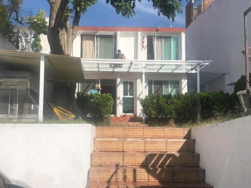 شرفة/ تراس, Casa de descanso con alberca y billar en Cuernavaca in Delicias