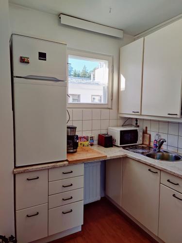 Kitchen, Costal Stay with Forest Views in Porslax