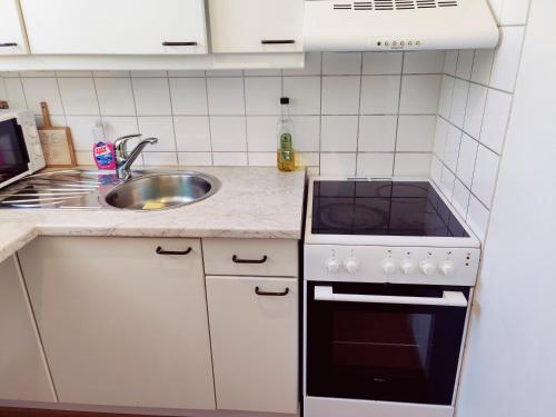 Kitchen, Costal Stay with Forest Views in Porslax