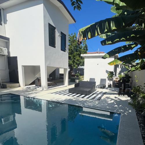 The Hibiscus House - King Suite, Terrace, and Pool in Aguadilla