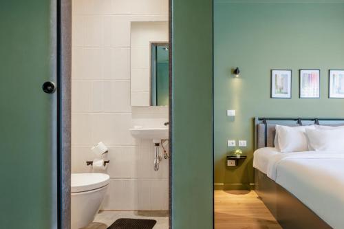 grey l studio apartments Downtown Cairo Ouzonian House - image 5
