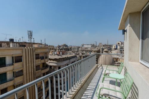 grey l studio apartments Downtown Cairo Ouzonian House - image 10
