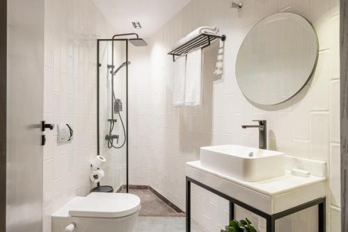 grey l studio apartments Downtown Cairo Ouzonian House - image 14