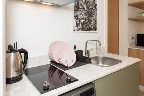 grey l studio apartments Downtown Cairo Ouzonian House in 카이로