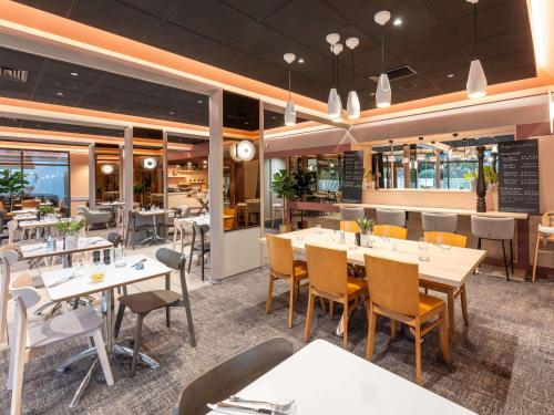Ресторан, Novotel Mâcon Nord Autoroute du Soleil in Сан-Альбен