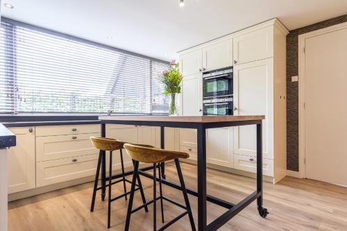 Familiehuis de Rheezermaten met Jacuzzi in Rheeze