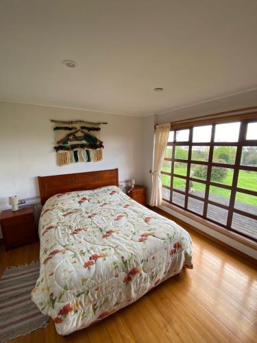 Habitación en hermosa casa con vista al lago y volcanes